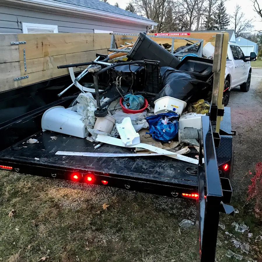 Roll-off dumpster delivered to a residential driveway in Long Branch